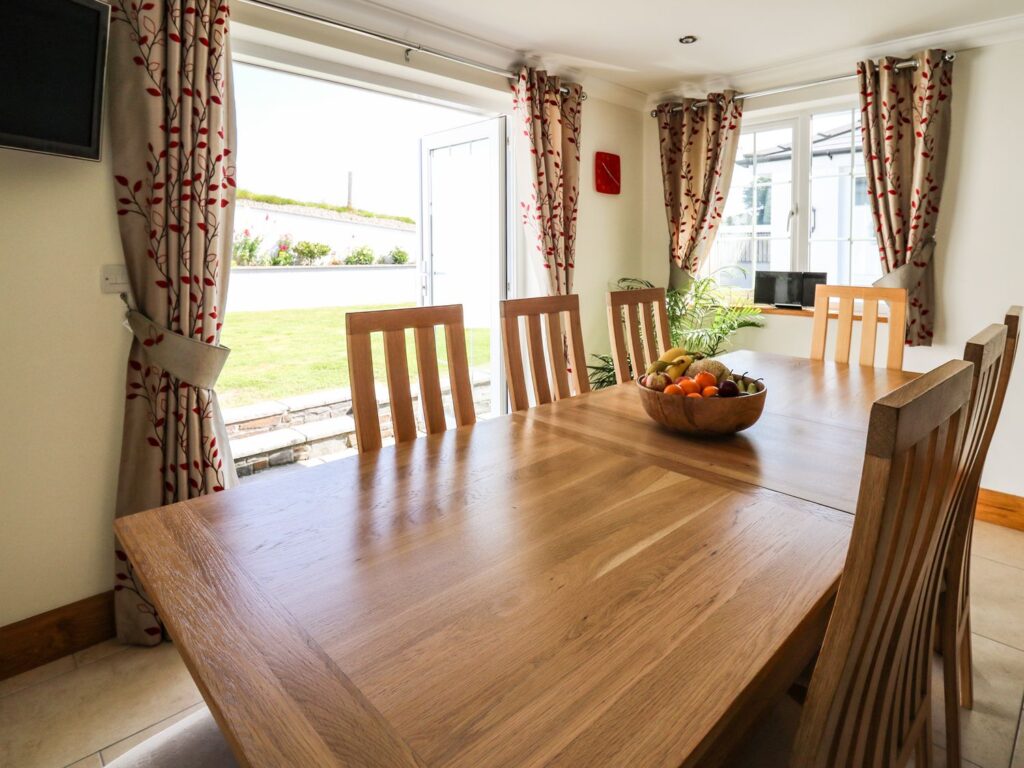 Large holiday accommodation dining room