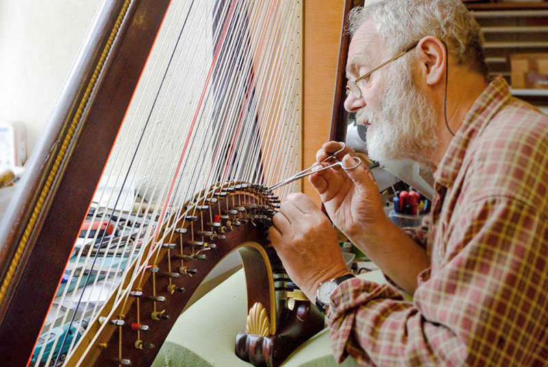 Harpmaker Allan Shiers servicing Welshp