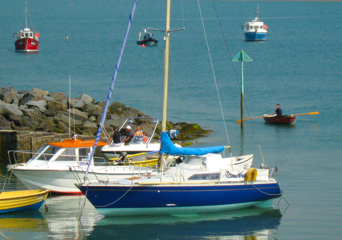 New Quay Harbour Cardigan Bay - Photo by F. Crompton New Quay Harbour Cardigan Bay - Photo by F. Crompton